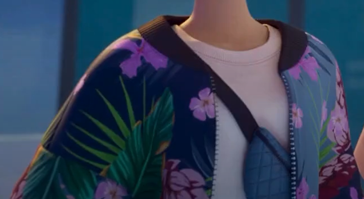 A picture of someone wearing a white t-shirt underneath a colorful blue floral jacket with a cross-body fanny pack strapped across their chest.